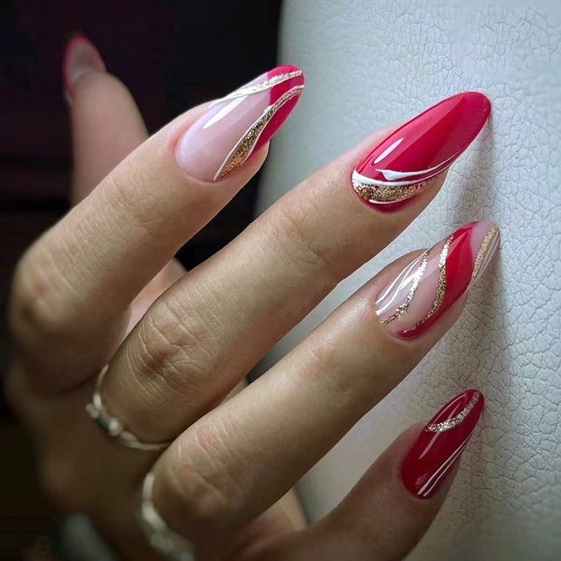 Elegant artificial nails with artistic lines and glitter accents Kalsten