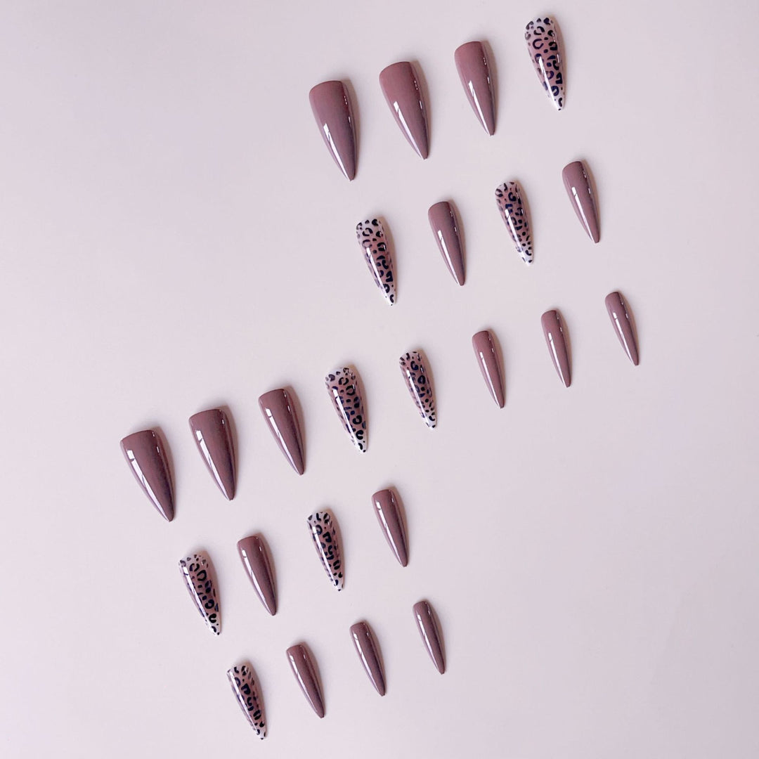 Nail set with elegant leopard pattern and modern stiletto design Kalsten