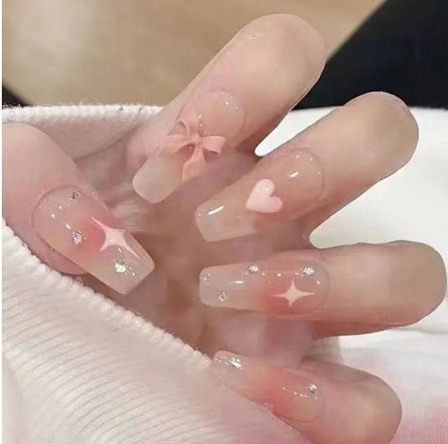Artistic Nail Art with Glitter and Flower Applications Kalsten