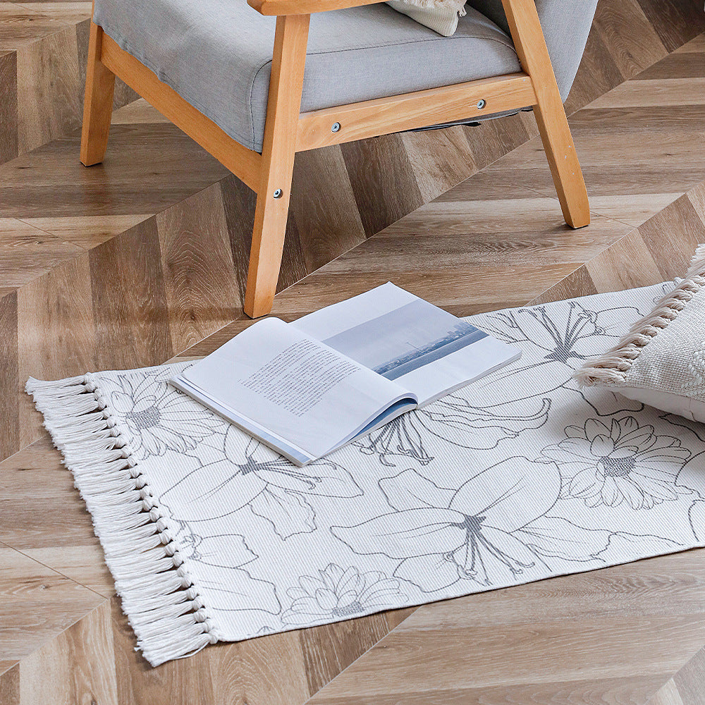 Decorative table runner made of cotton with botanical bird print and fringes Kalsten
