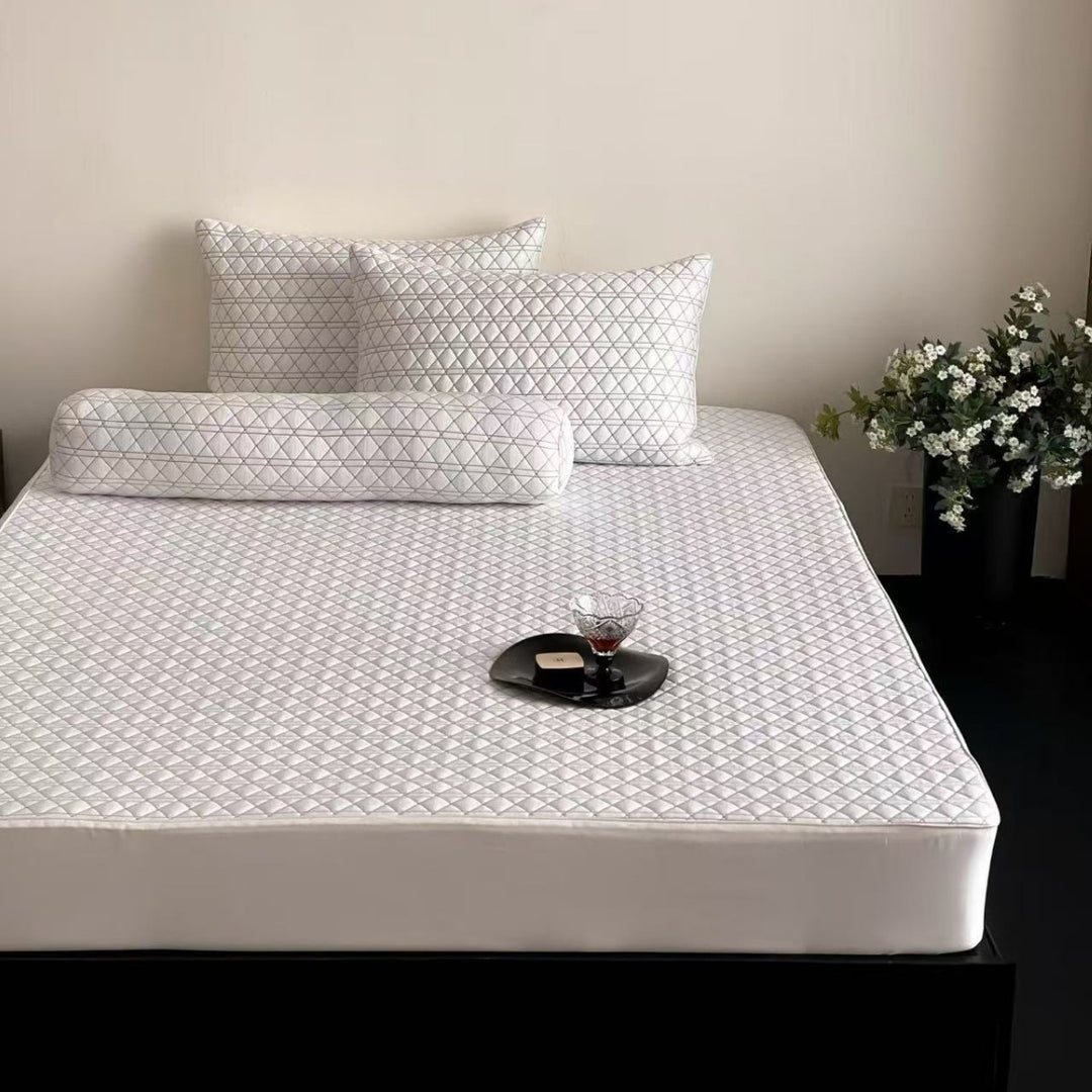 Quilted mattress topper set with non-slip underside, breathable microfiber and pillowcases
