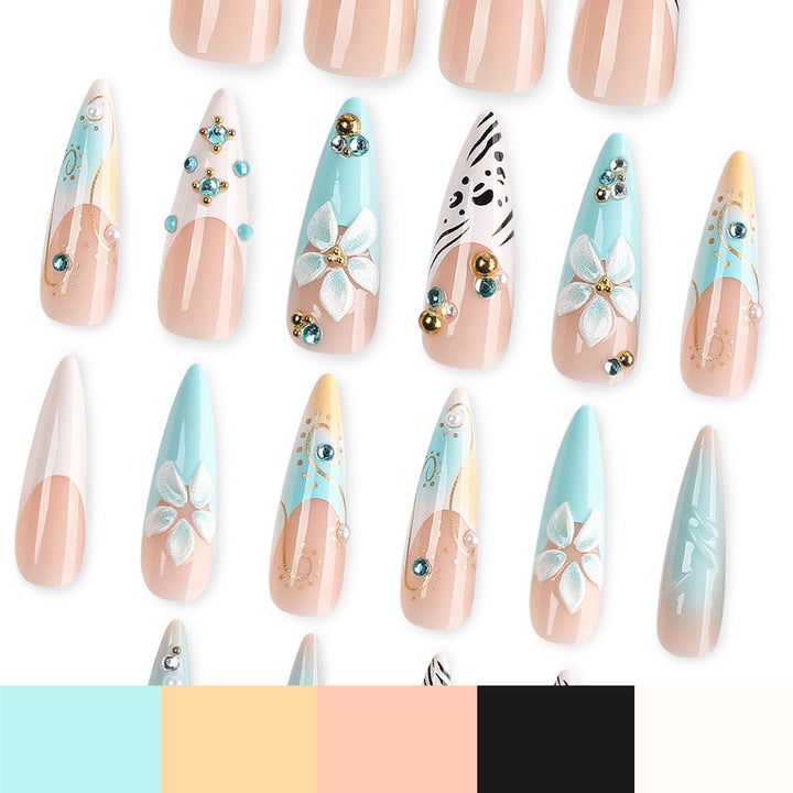 Artistic stiletto nails with floral accents and glitter details Kalsten