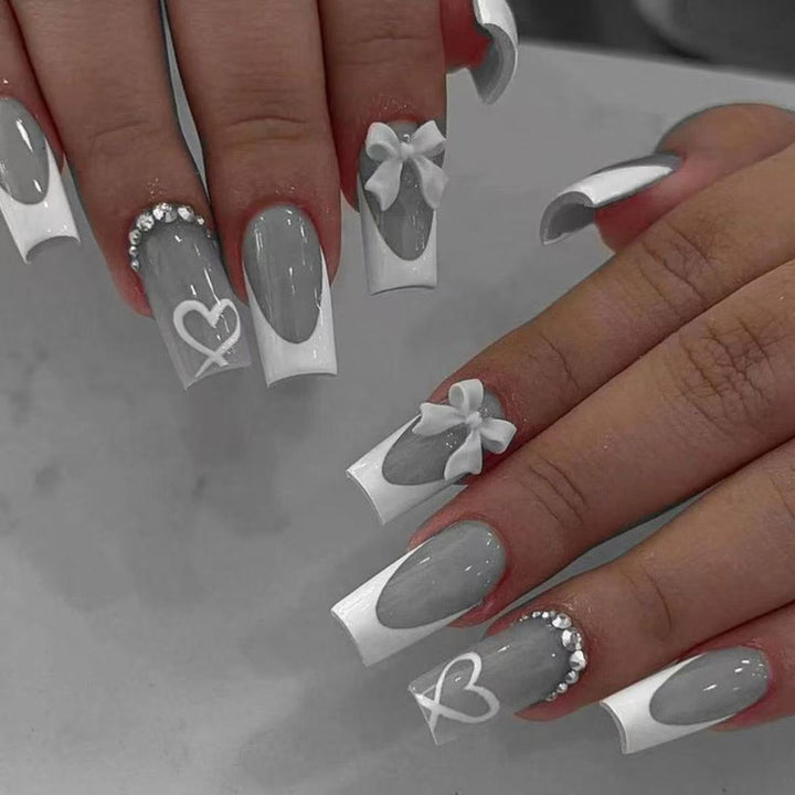 Artificial nail set with elegant bow and glitter decorations Kalsten