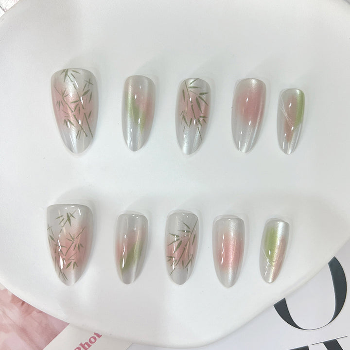 Artificial nail tips with elegant design and botanical accents Kalsten