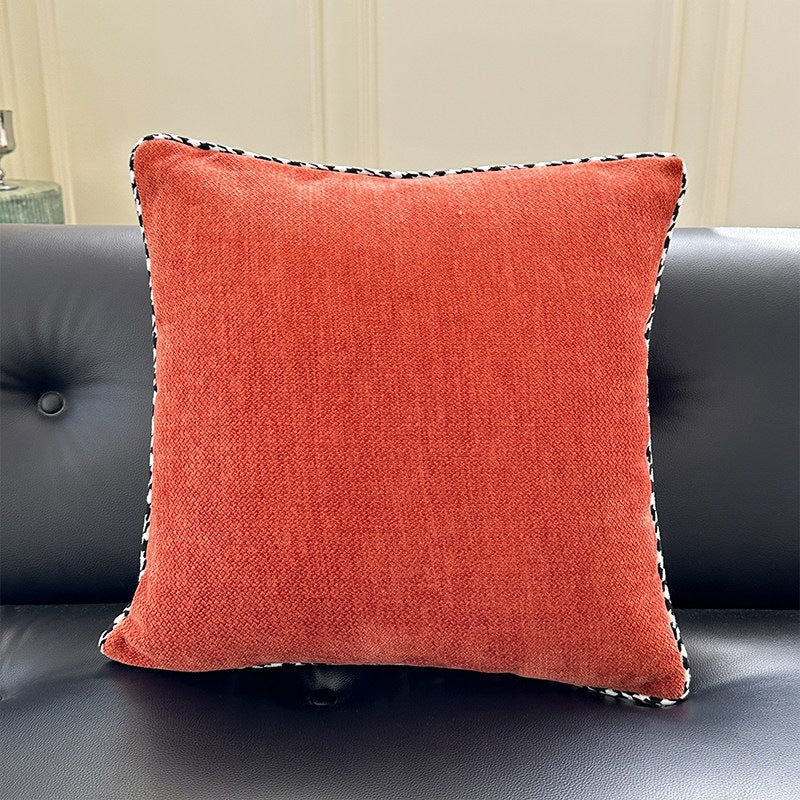 Decorative square decorative pillow made of soft velvet with contrasting piping
