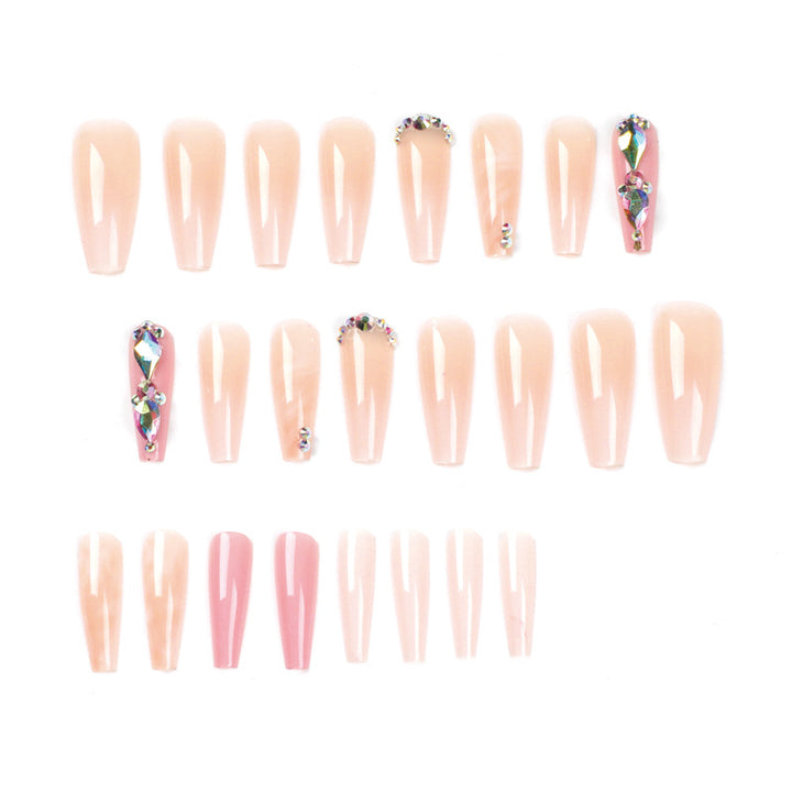 Glamorous artificial nails with gemstone embellishments Kalsten
