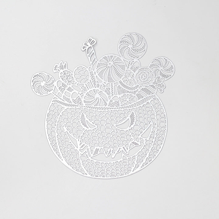Filigree laser-cut pumpkin placemat made of wood for Halloween table decoration