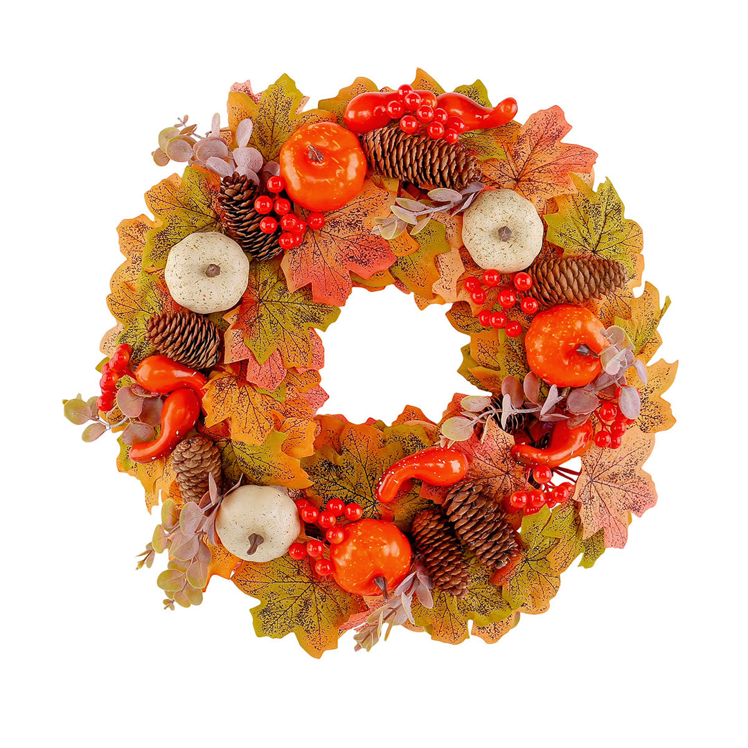 Autumn door wreath with artificial maple leaves, cones, and decorative pumpkins