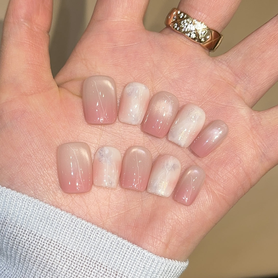 Artificial nails with elegant gradient colors and holographic accents Kalsten