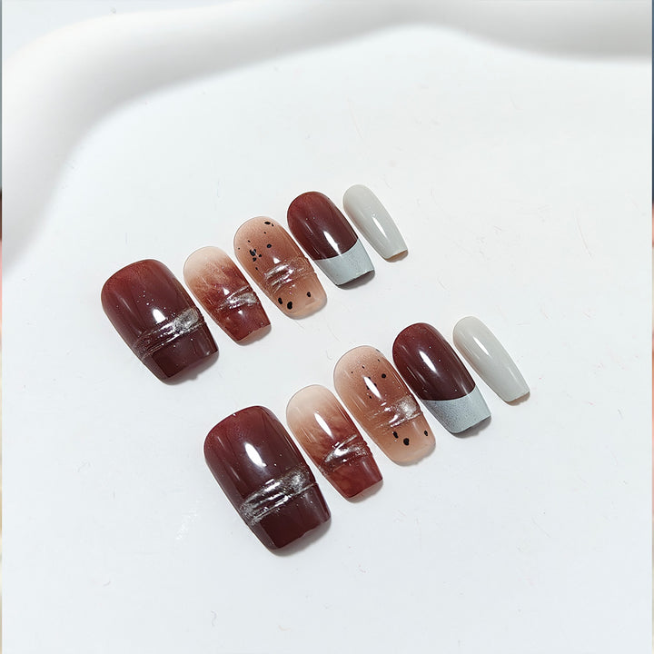 Trendy artificial nails with elegant metallic and gradient effects Kalsten
