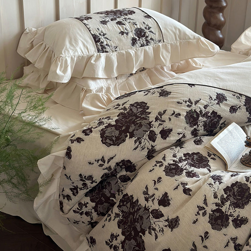 Romantic bedding set made of cotton-linen blend with floral jacquard border and ruffle
