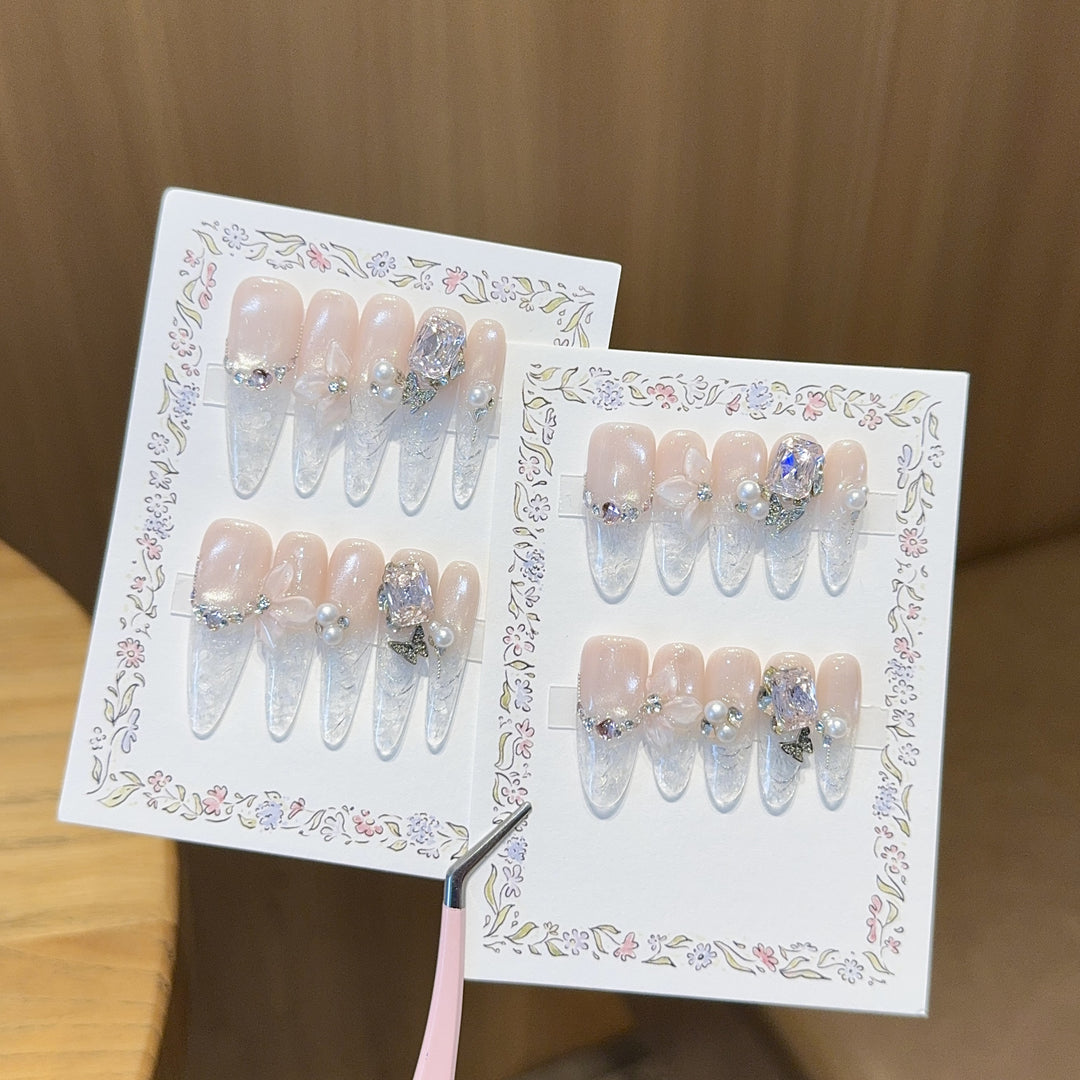 Artificial nails with delicate glitter and pearl decoration Kalsten