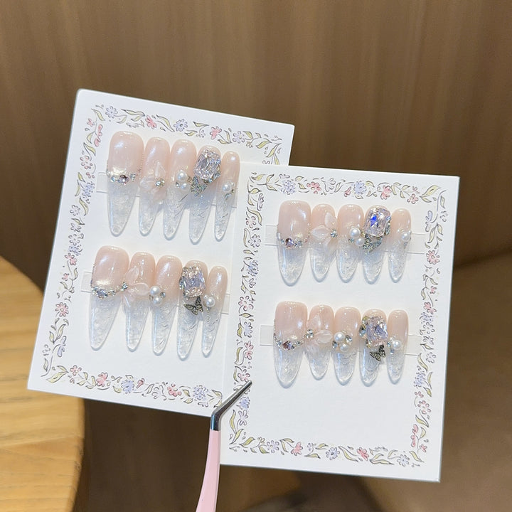 Artificial nails with delicate glitter and pearl decoration Kalsten