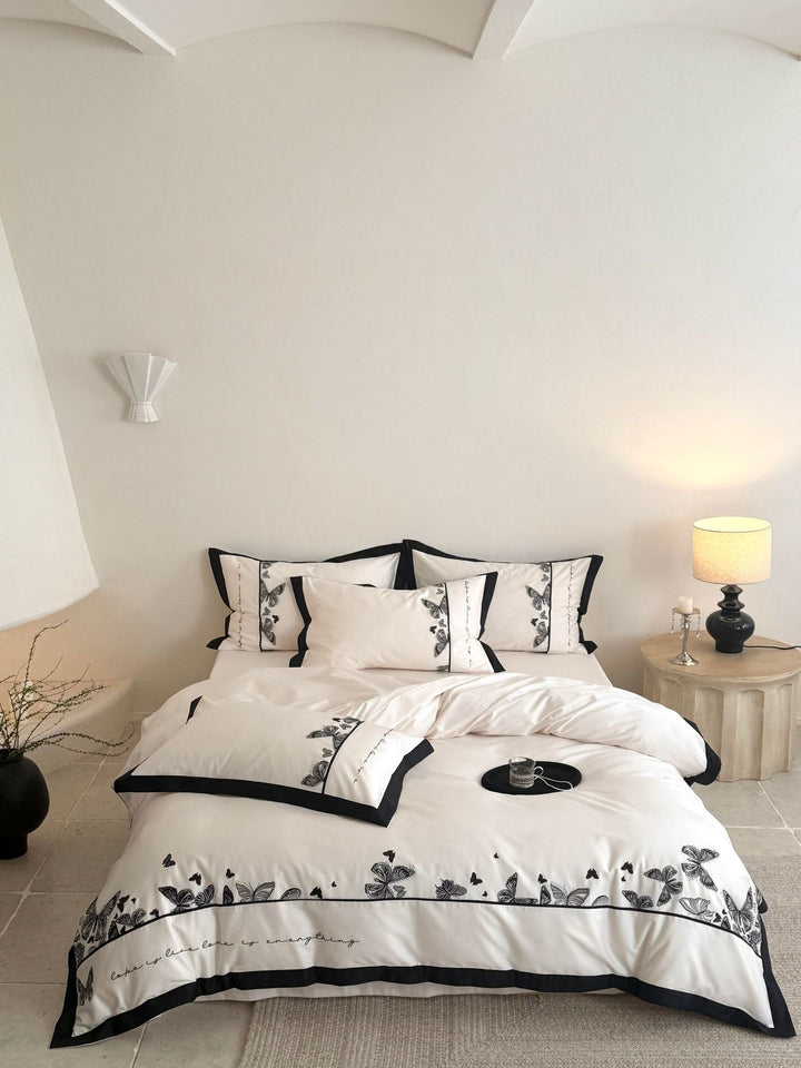 Luxurious cotton satin bedding set with butterfly embroidery and contrasting piping Kalsten