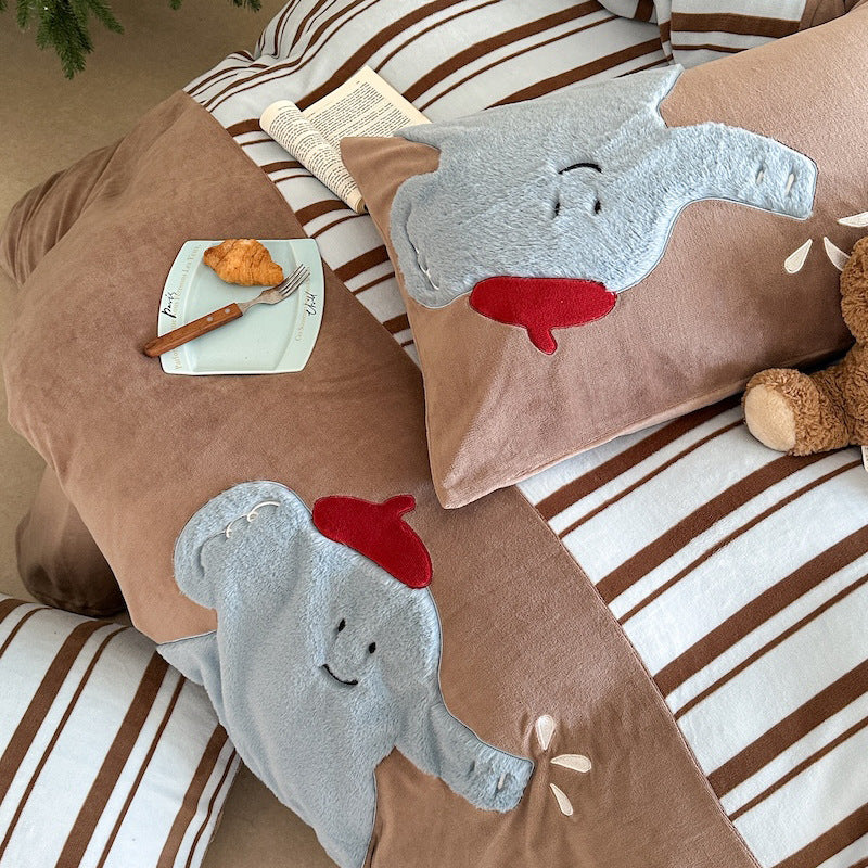 Quilted bedding and throw blanket set with check stitching, velvet texture, and floral appliqué
