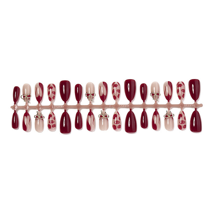 Artificial nail set with elegant bow and lip designs Kalsten