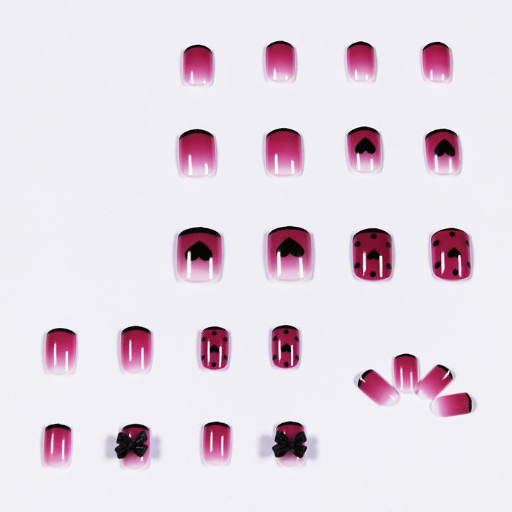 Artistic nail extensions with cute bow and heart designs Kalsten