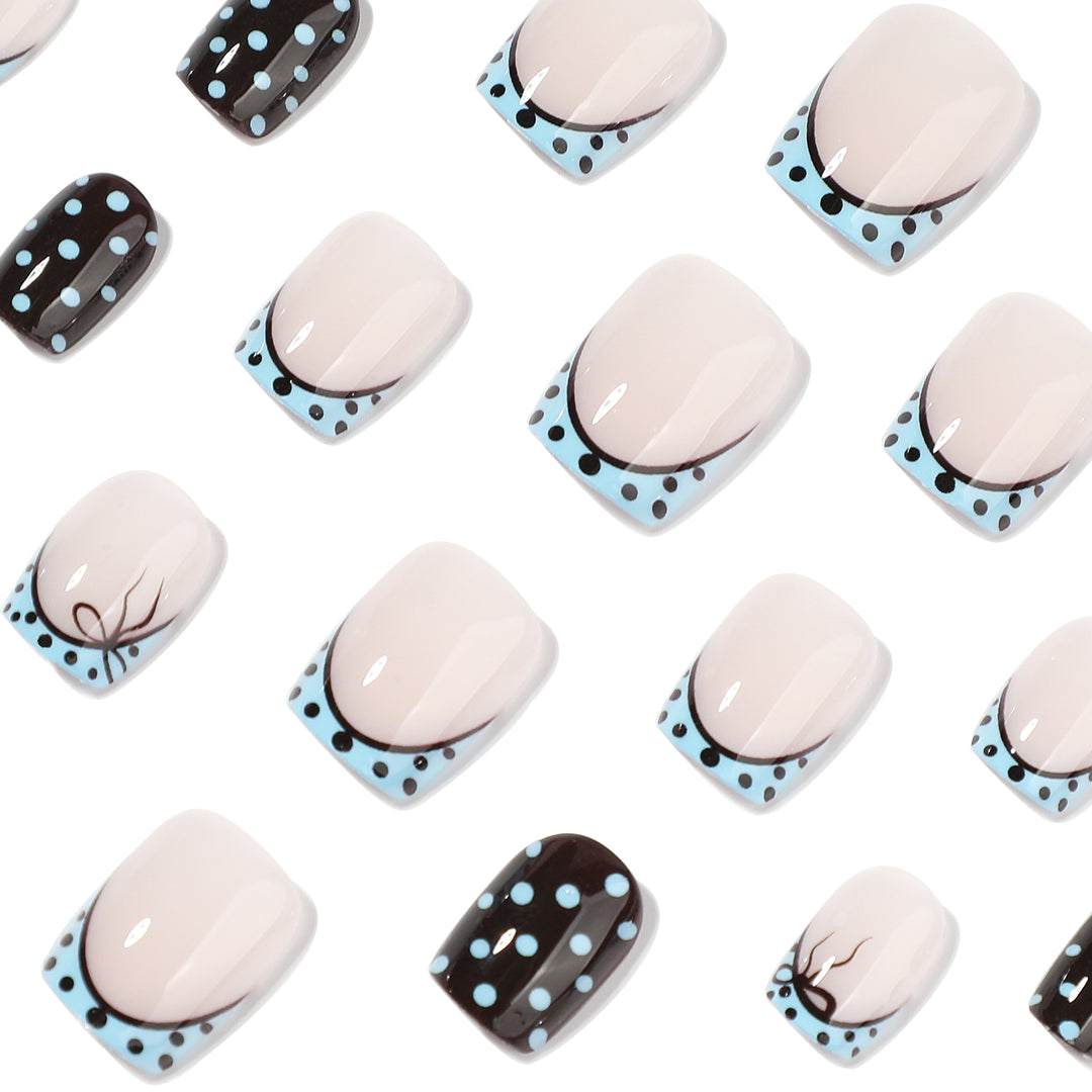 Artful nail extensions with playful dots and elegant design Kalsten