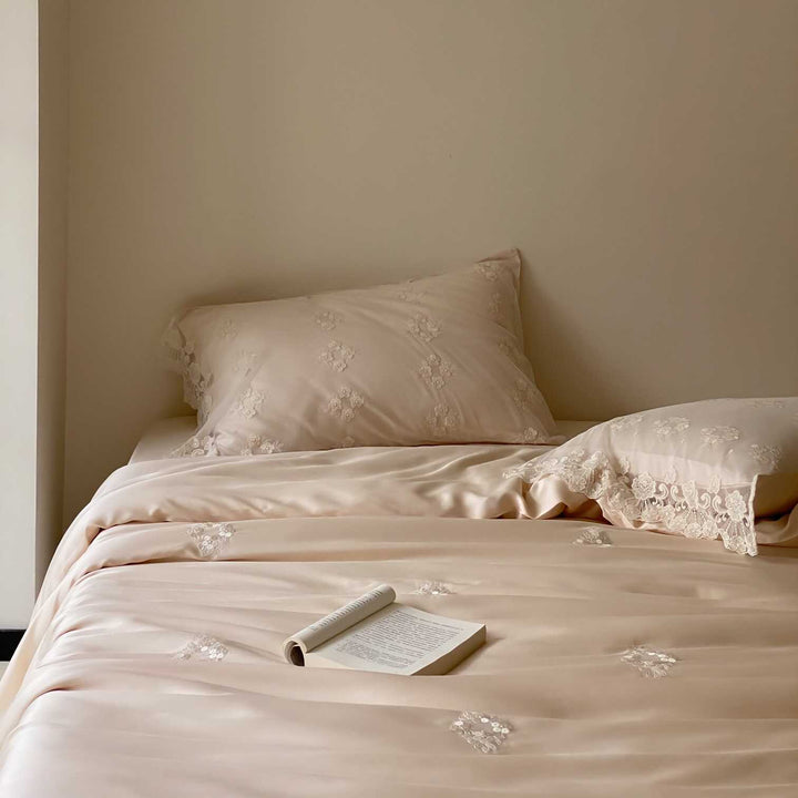 Satin bed linen set with lace trim, floral embroidery & silky touch
