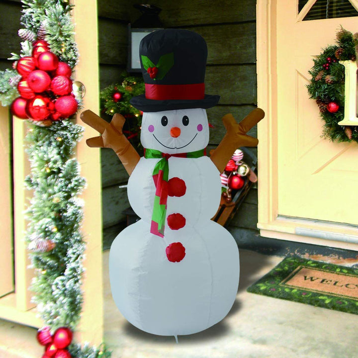Inflatable snowman with festive decorations