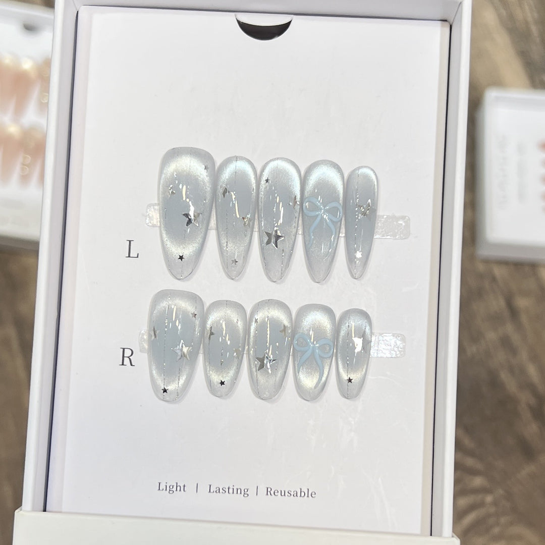 Decorative Stiletto Press-On Nail Set with Star and Bow Accents Kalsten