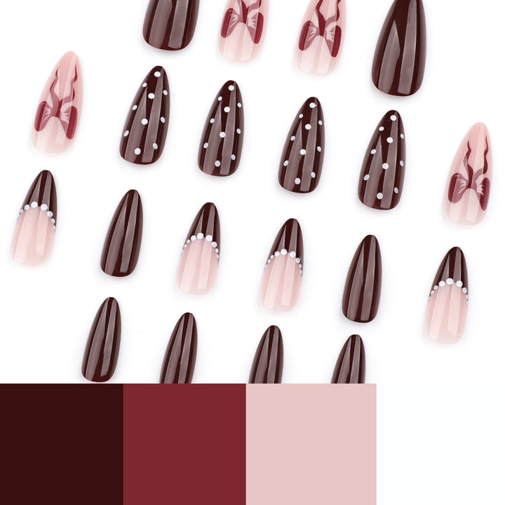 Elegantly designed stiletto nails with artistic accents Kalsten