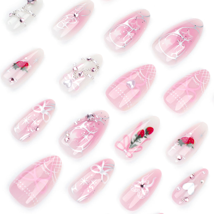 Artificial nail art with romantic design and glitter accents Kalsten