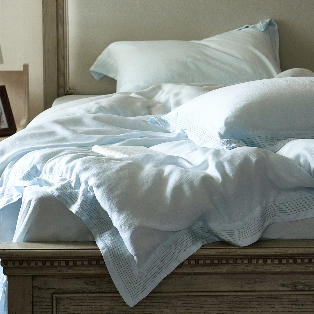 Luxury cotton bedding set with fine piping and elegant linen look