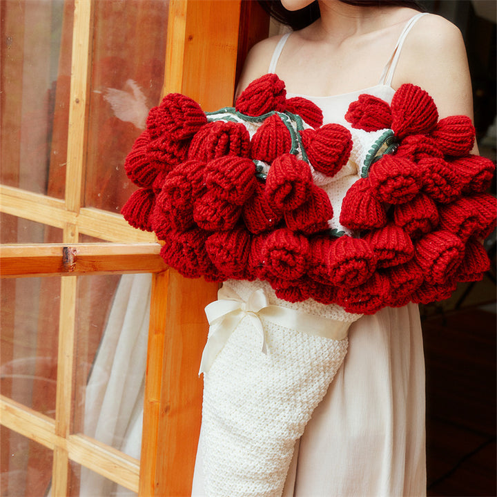 Crocheted throw blanket with 3D sunflower appliqués and chunky stitch structure
