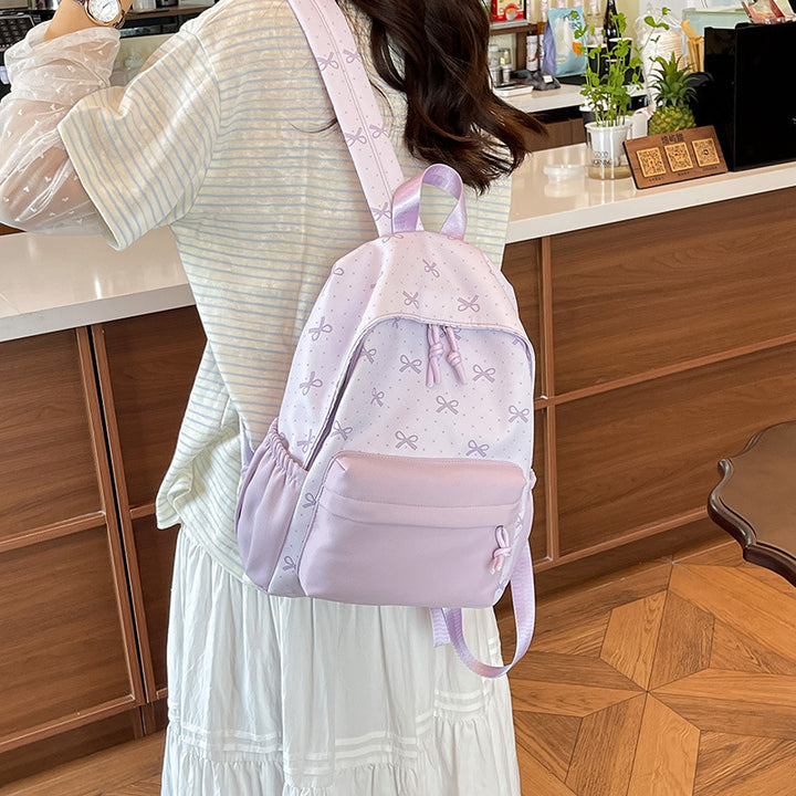 Cute everyday backpack with embroidered bows Kalsten