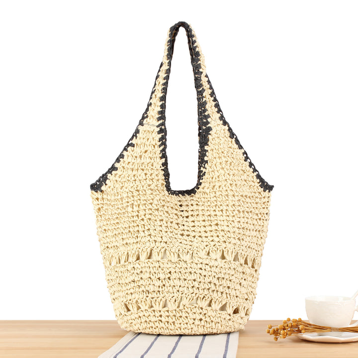 Beach shoulder bag made of handwoven natural material with comfortable carrying handles Kalsten