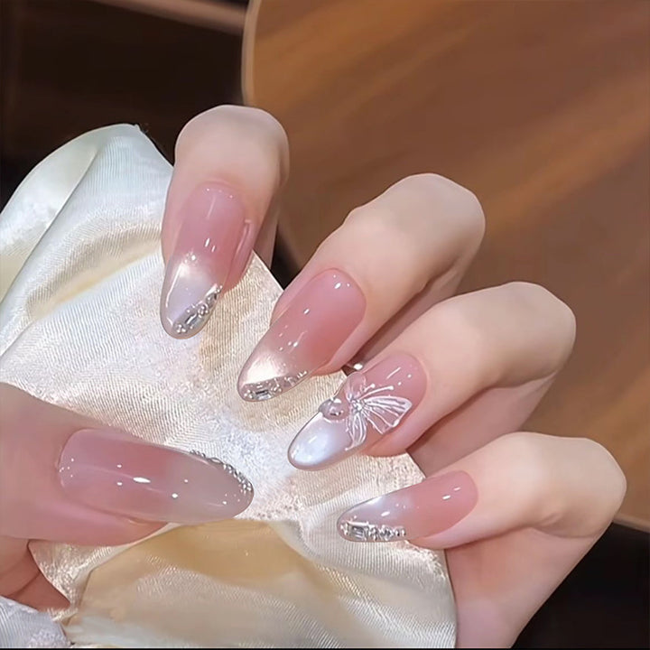 Acrylic nail set with elegant ombre design and sparkling accents Kalsten