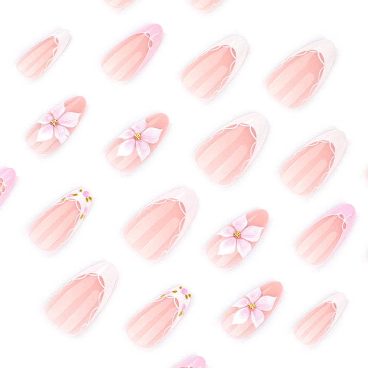 Artful nail extensions with delicate floral pattern and elegant accents Kalsten