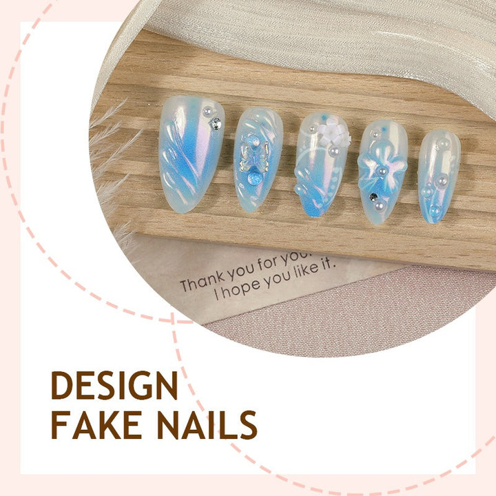 Creative nail set with floral accents and glittering details Kalsten