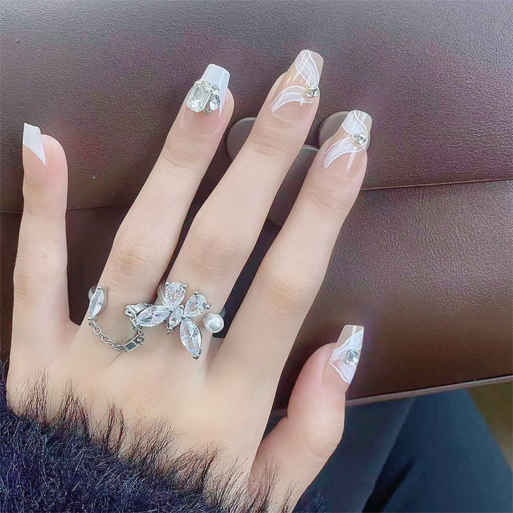 Elegant artificial nail set with delicate decorations and glitter elements Kalsten