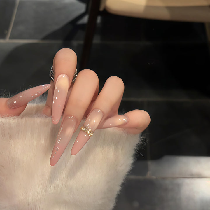 Glamorous artificial nails with elegant glitter and rhinestone application Kalsten