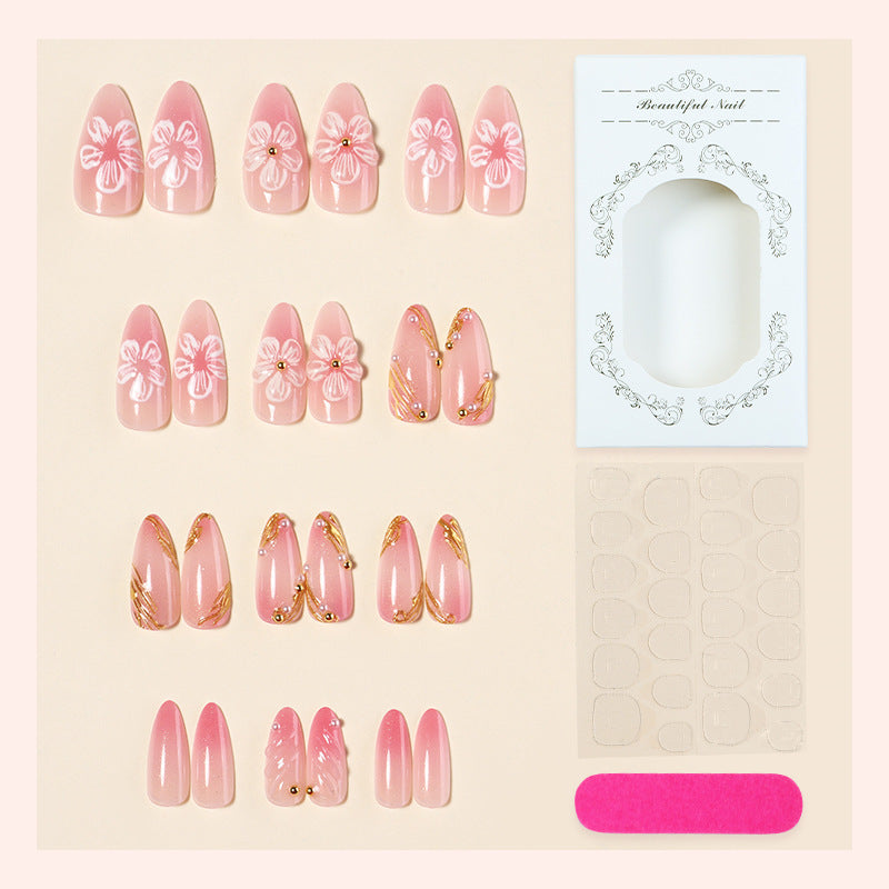 Creative nail art set with floral and golden accents Kalsten