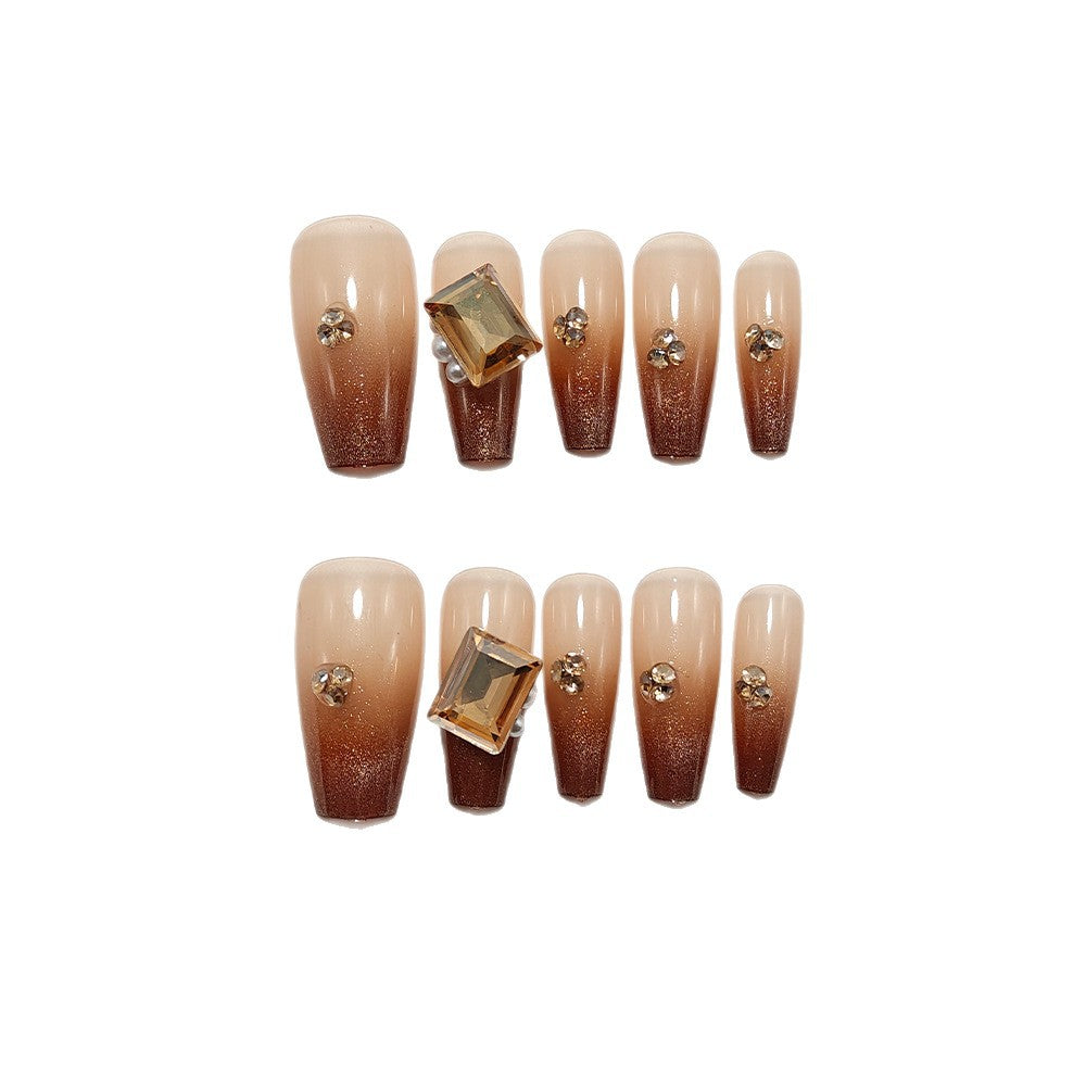Artificial nails with elegant ombre effect and exquisite gemstones Kalsten