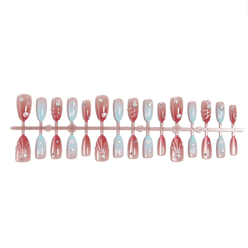 Artificial nails with sparkling rhinestone embellishments and maritime design Kalsten