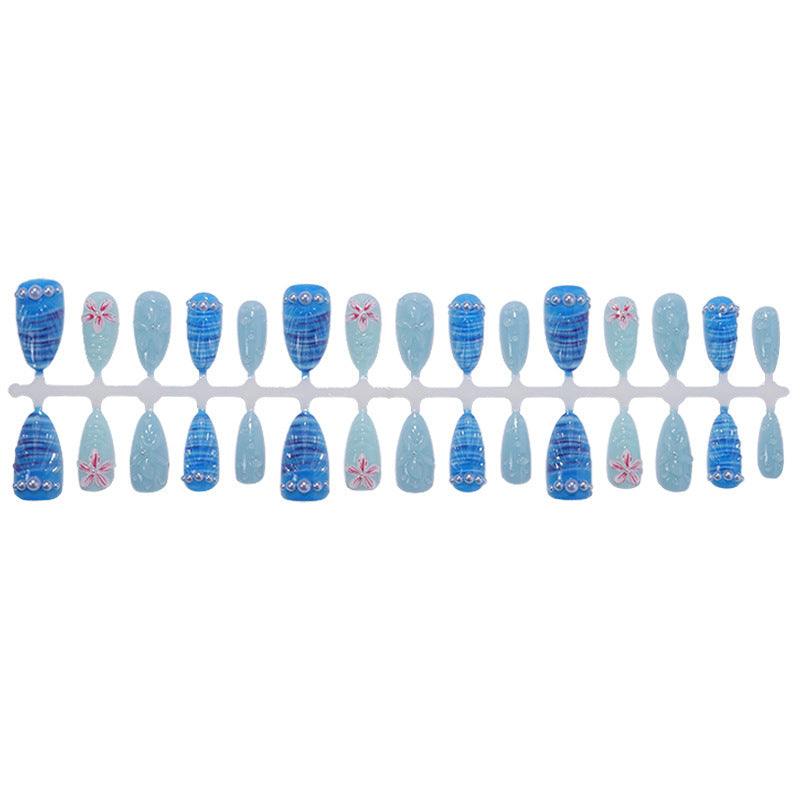 Nail art set with unique aquatic motifs and decorative accents Kalsten