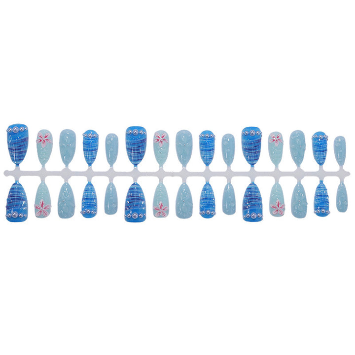 Nail art set with unique aquatic motifs and decorative accents Kalsten
