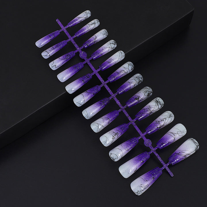 Artificial nails in modern ombre design with marbled accents Kalsten