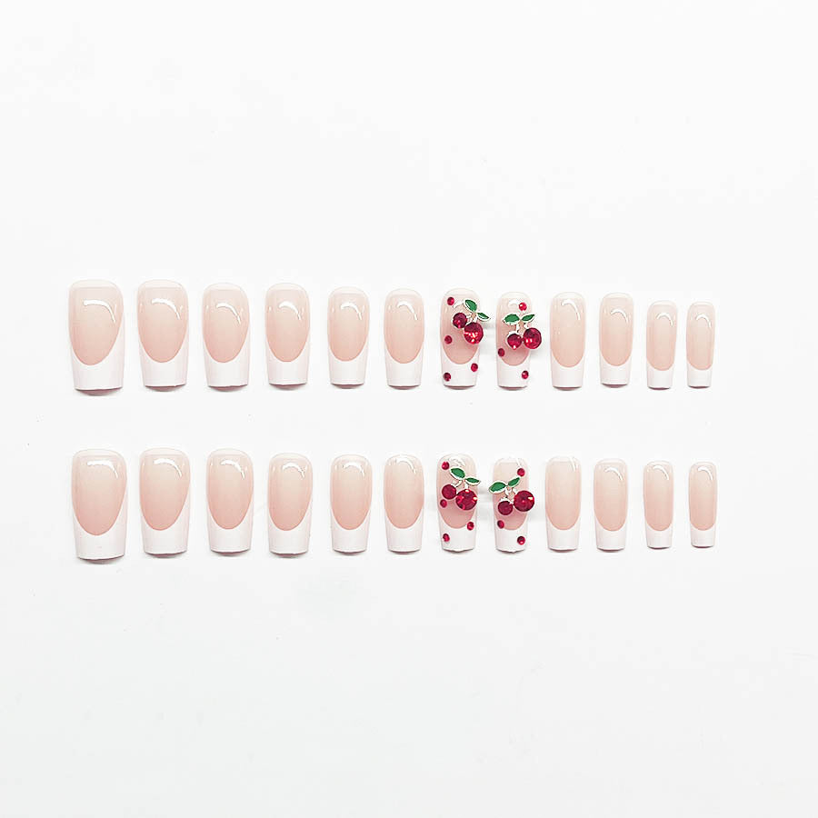 Acrylic nail set with chic cherry motifs and elegant French tip Kalsten