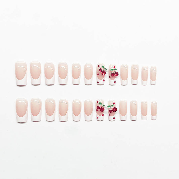 Acrylic nail set with chic cherry motifs and elegant French tip Kalsten