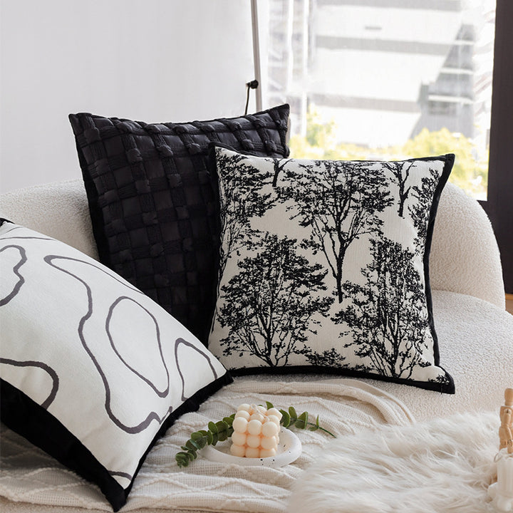 Square jacquard cushion cover with monochrome tree motif and contrasting piping Kalsten