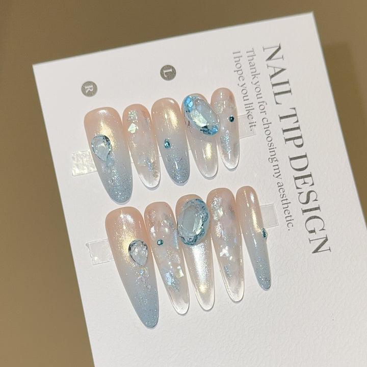 Artificial nails with rhinestones and glitter effects Kalsten