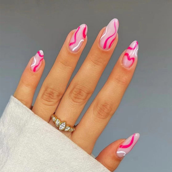 Artful nail extensions with an elegant leaf pattern Kalsten
