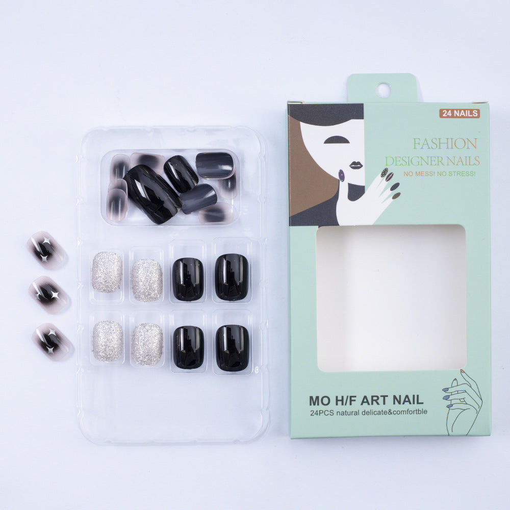 Artificial nails in elegant black with gloss and creative accents Kalsten
