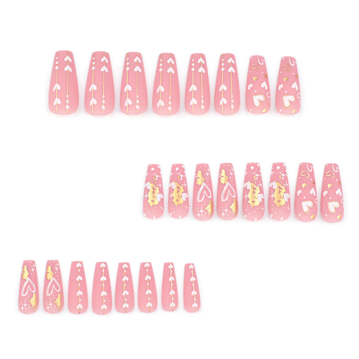 Artificial nail art with heart and glitter designs Kalsten