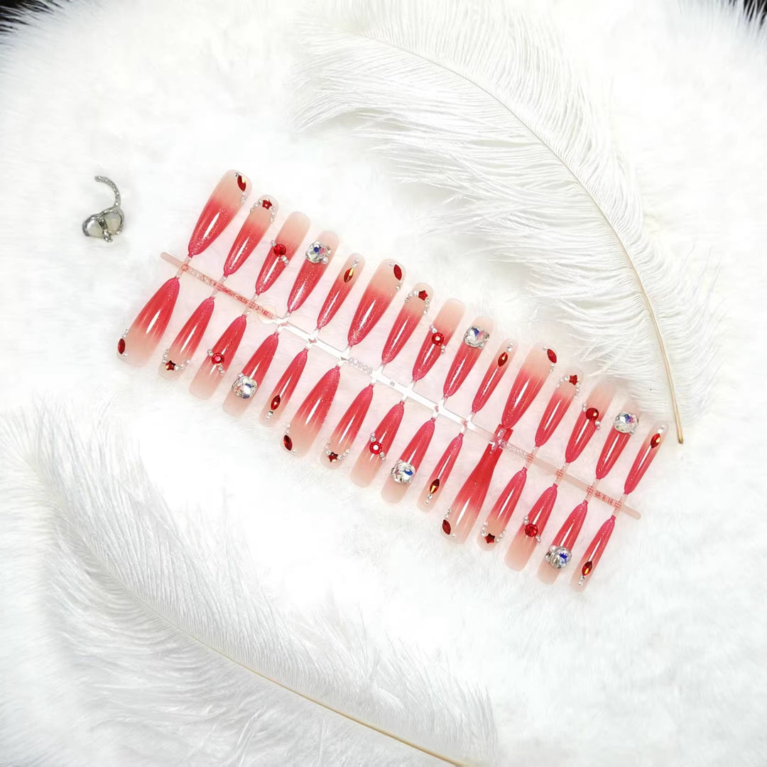 Glamorous artificial nails with sparkling ombre effect and elegant embellishments Kalsten